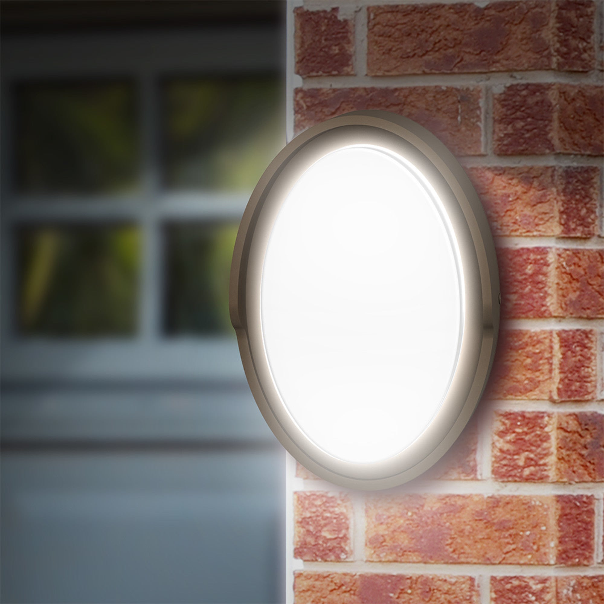 17W 1200 Lumen Adjustable White Dusk to Dawn Oval Outdoor Wall