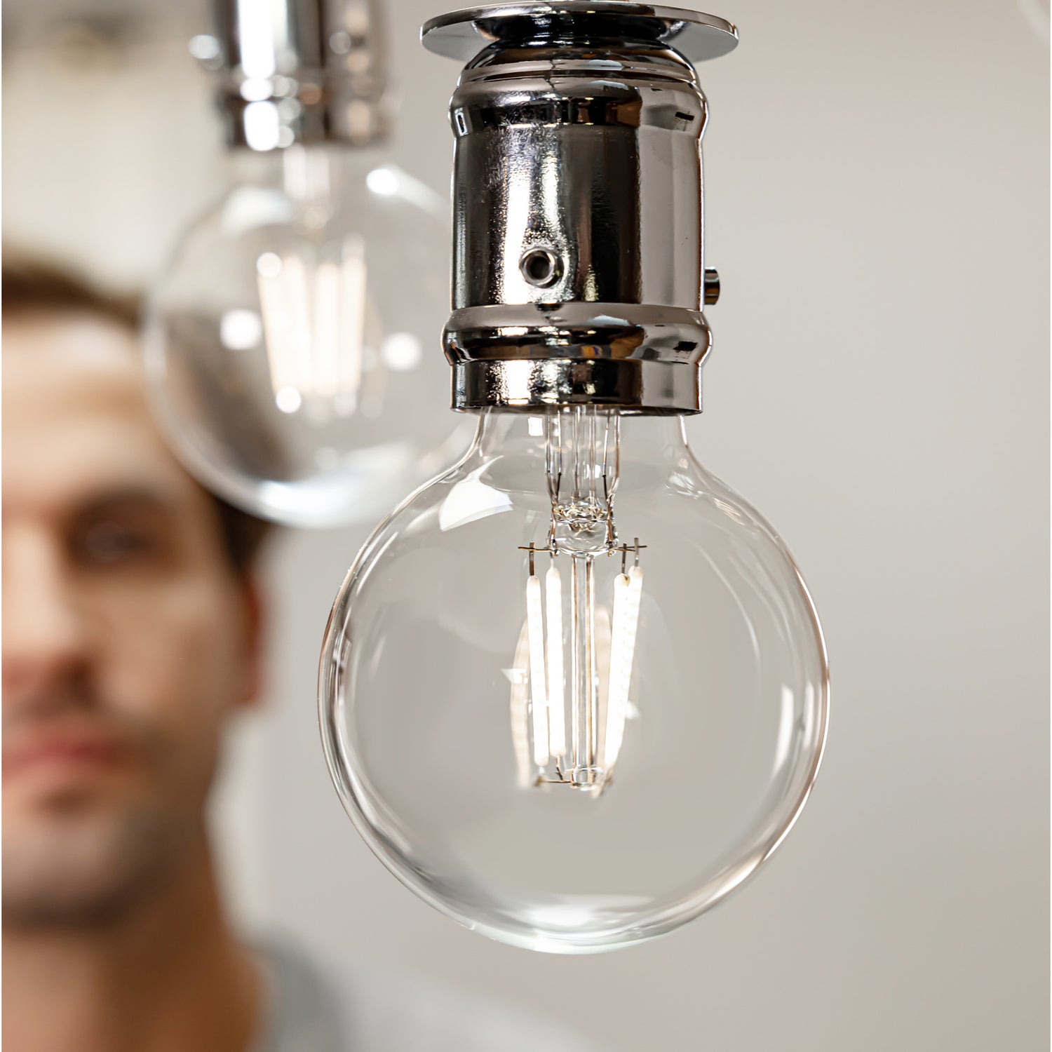5.5W (60W Replacement) True White (3500K) G16 1/2 Globe Shape (E12 Base) Exposed White Filament LED Bulb (2-Pack)