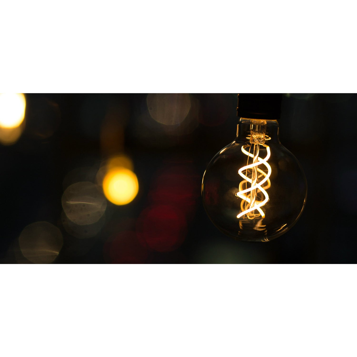 6.5W (60W Replacement) G63 E26 Dimmable Spiral Filament Amber Glass Vintage Edison LED Light Bulb, Warm White