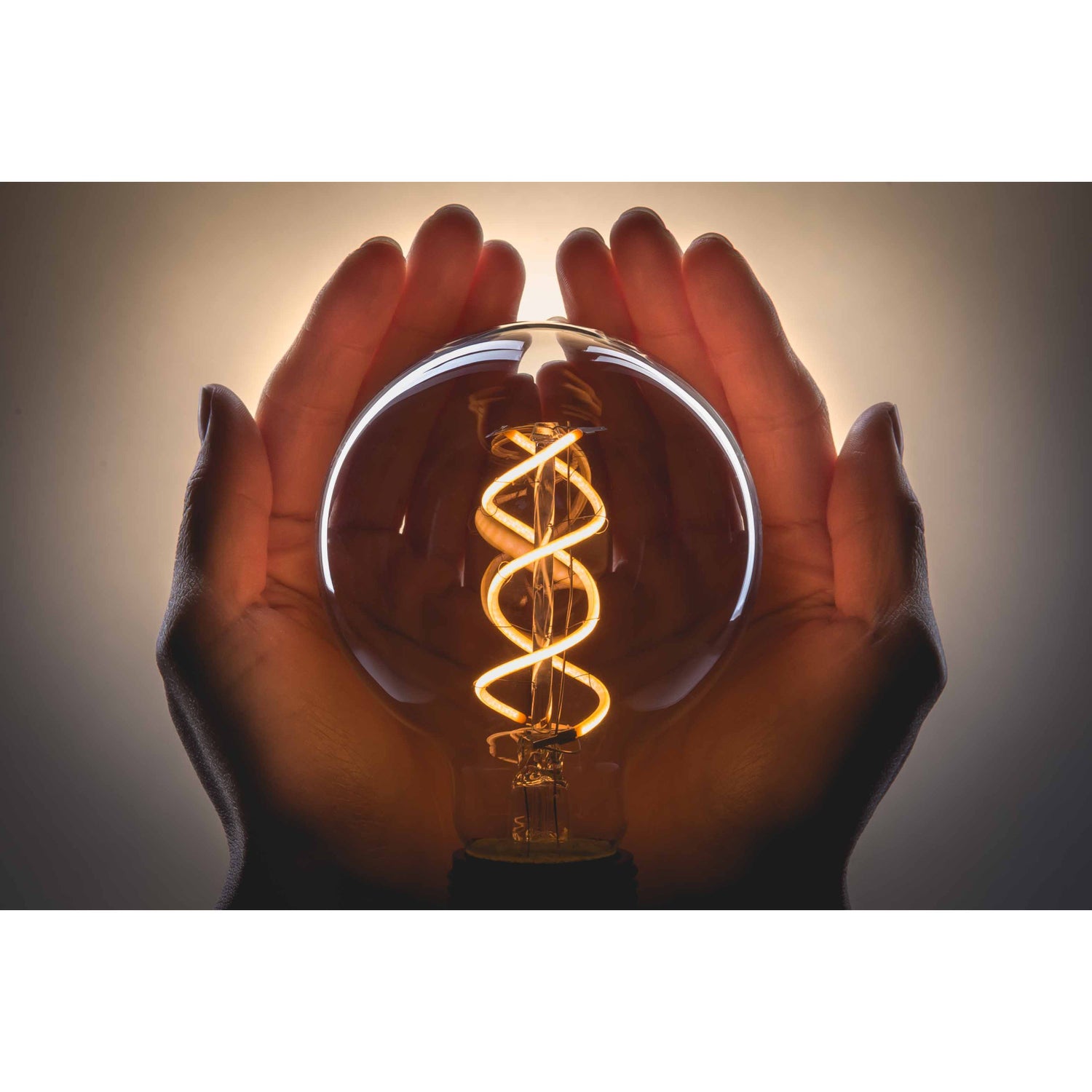 6.5W (60W Replacement) G63 E26 Dimmable Spiral Filament Amber Glass Vintage Edison LED Light Bulb, Warm White