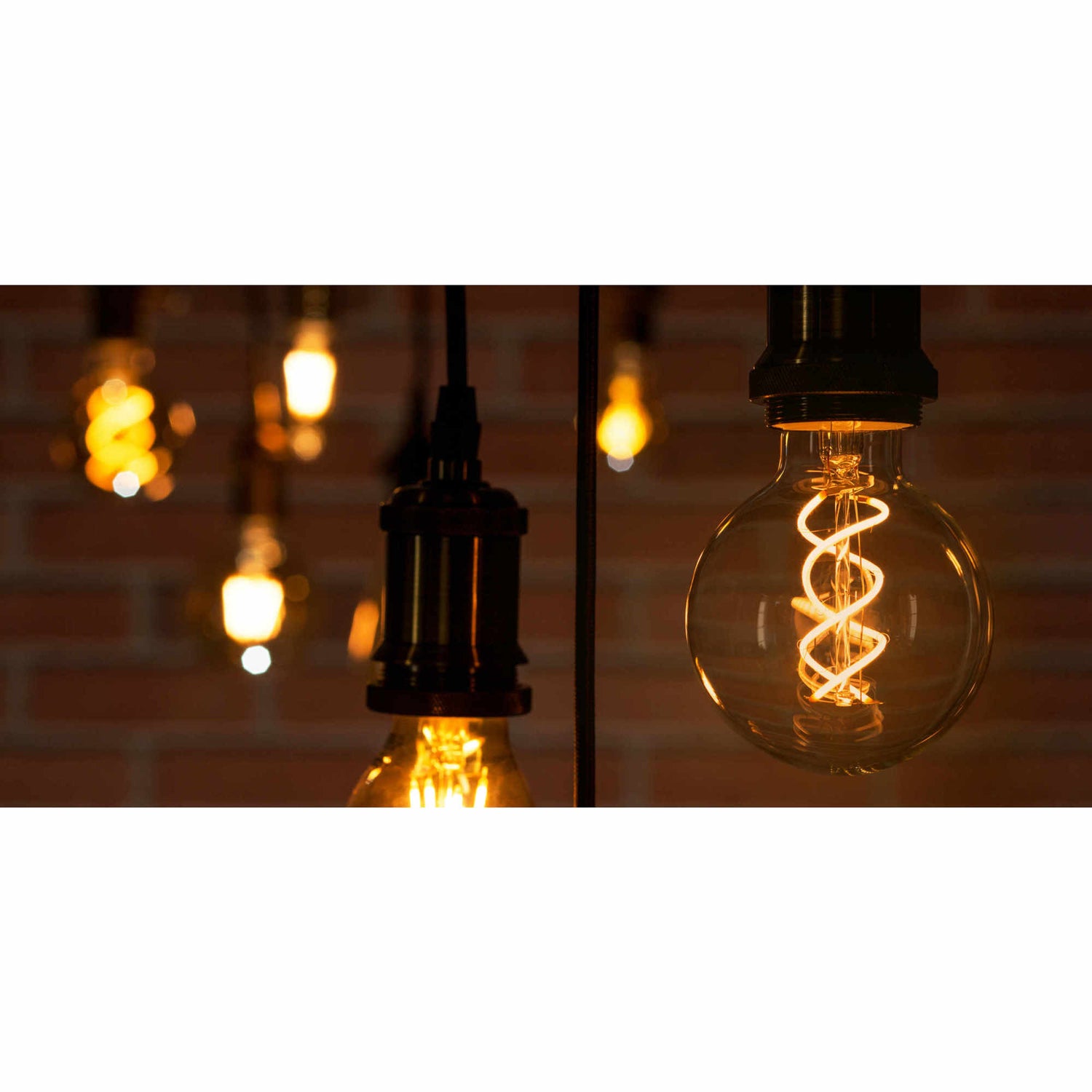 6.5W (60W Replacement) G63 E26 Dimmable Spiral Filament Amber Glass Vintage Edison LED Light Bulb, Warm White